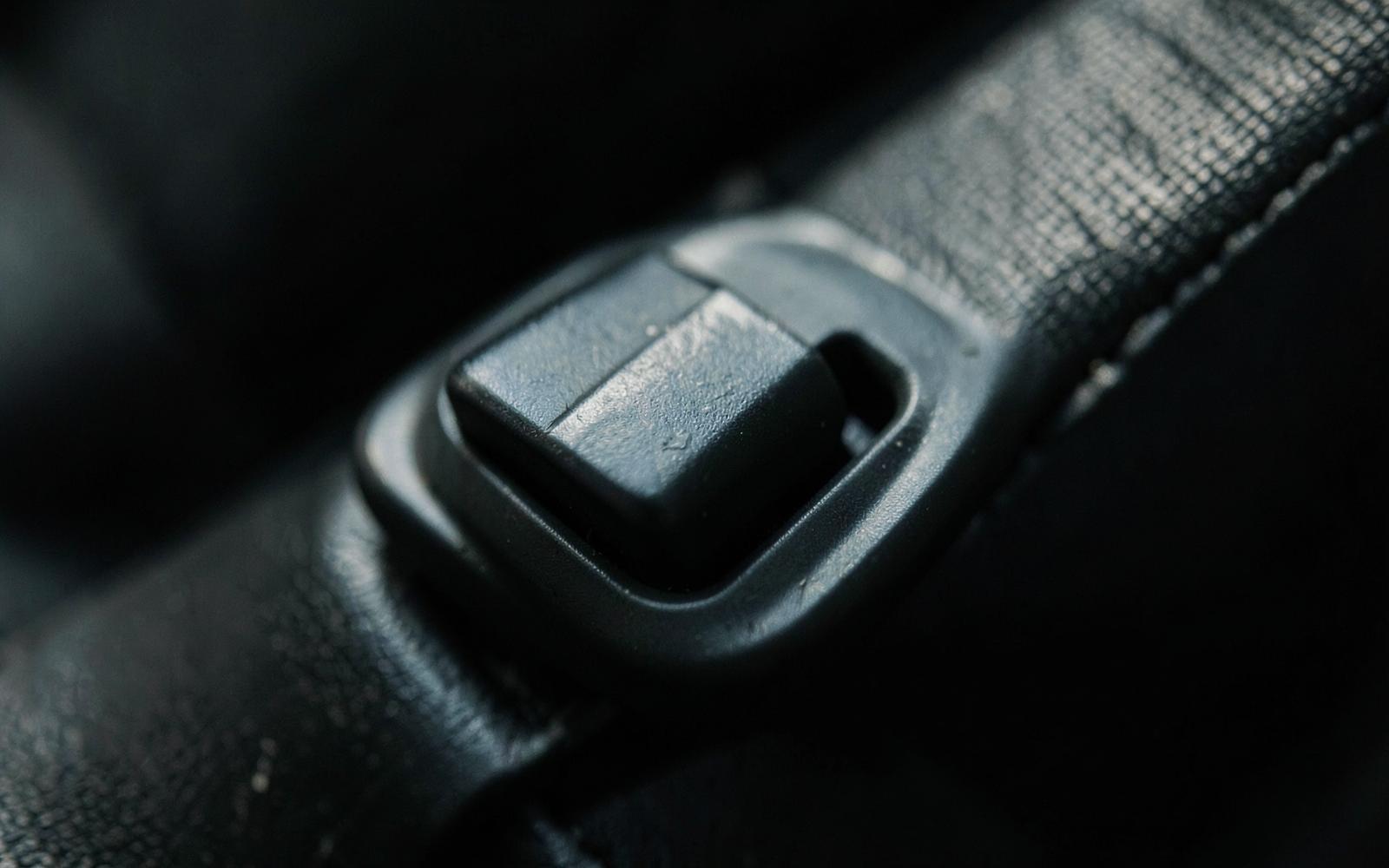 Macro photograph of a seatbelt buckle